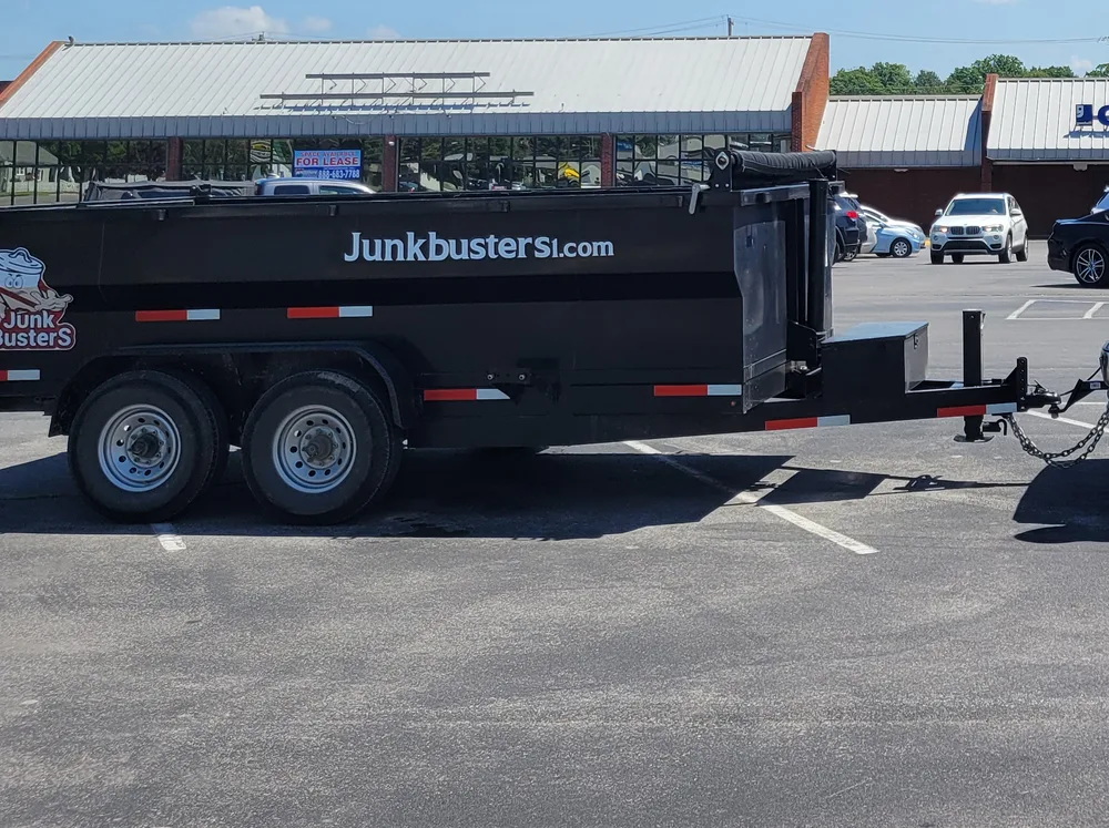 Junk Busters roll-off dump trailer / dumpster